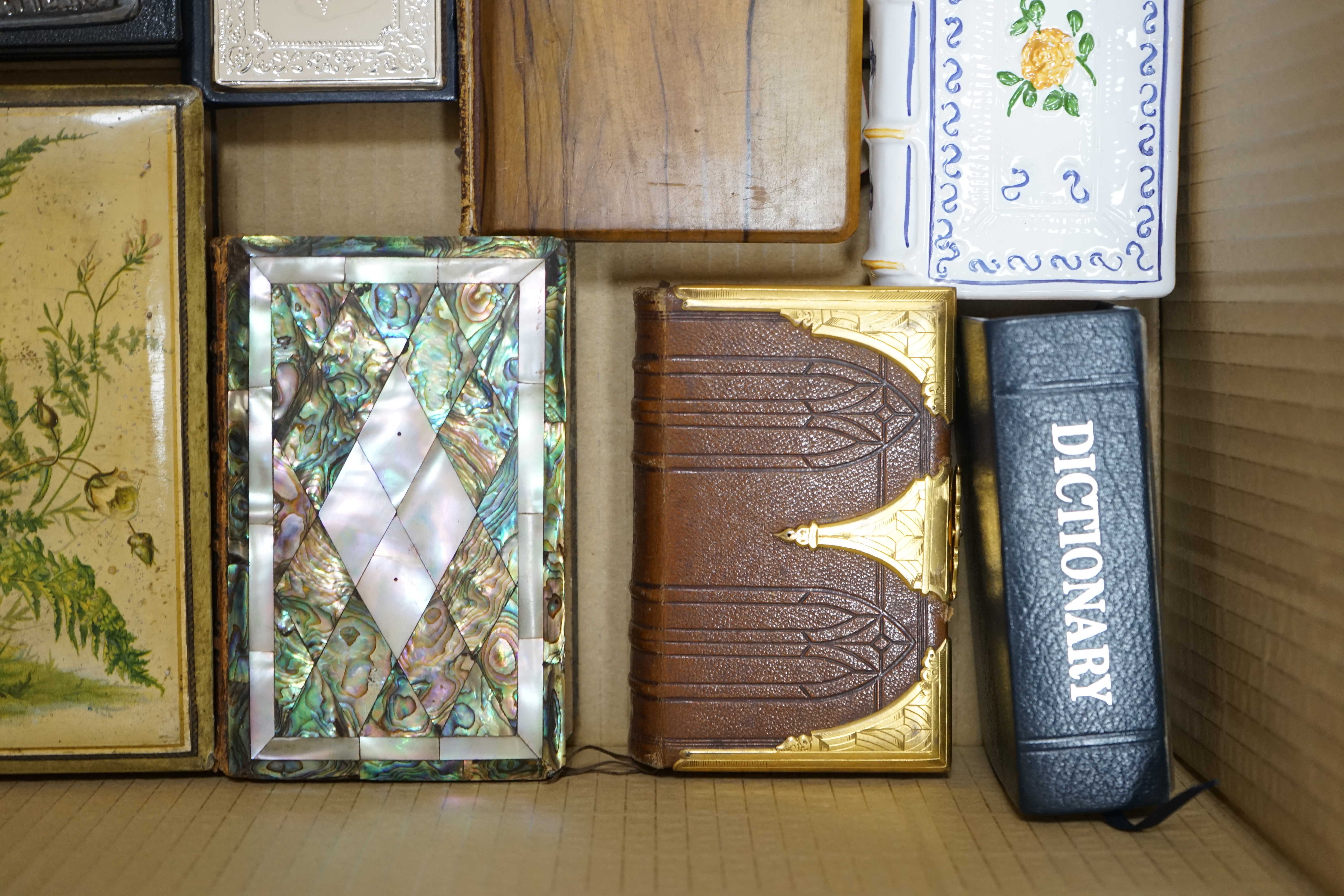 A small group of other assorted novelty bindings, including mother of pearl, leather and silver plate. Condition - varies